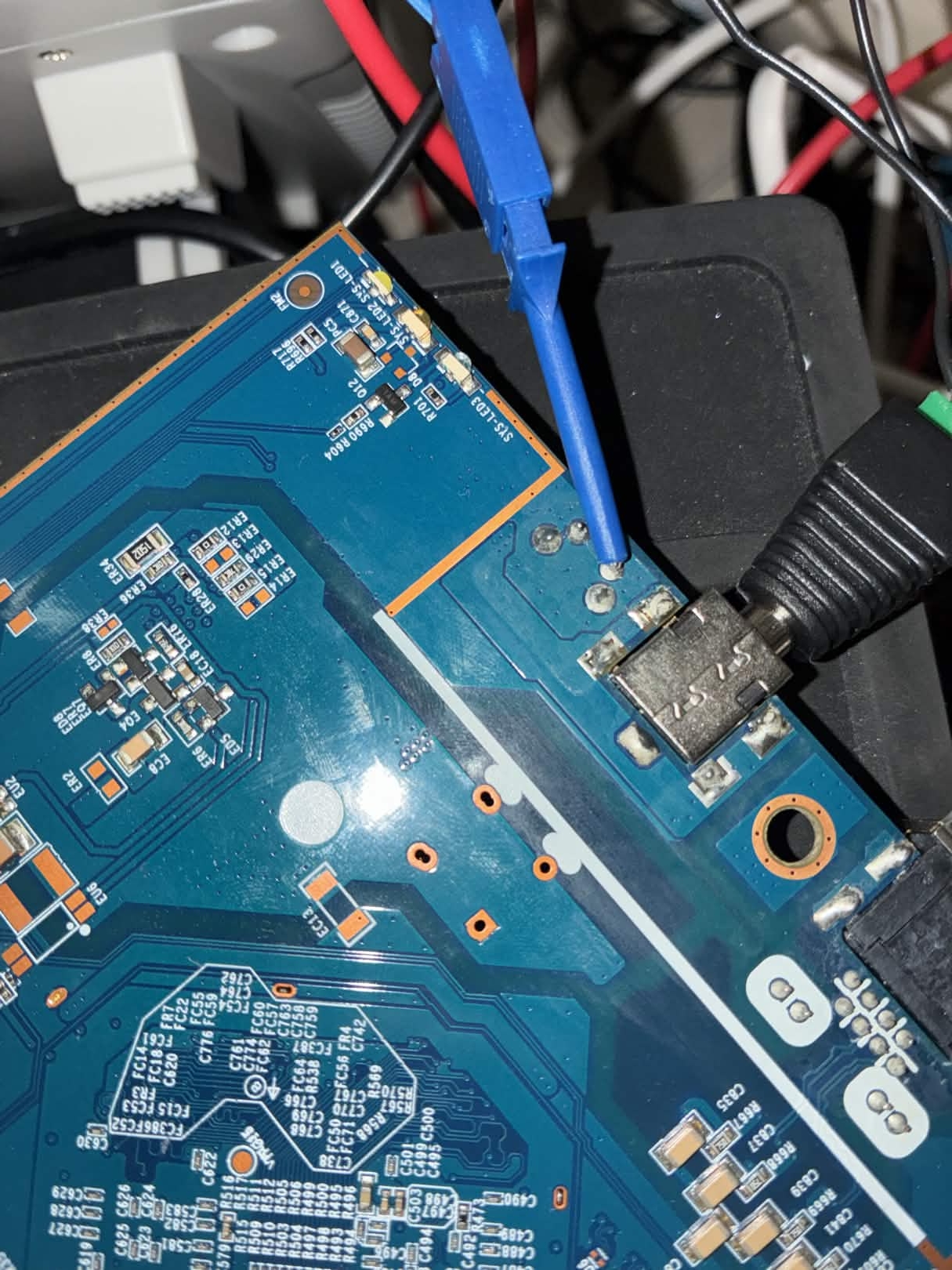 Close-up of the J3 JTAG header solder job on the MR18 PCB